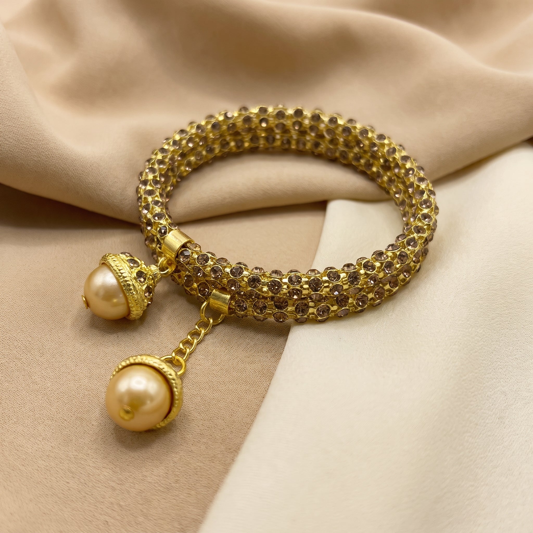 Two line diamod beaded spiral braclate