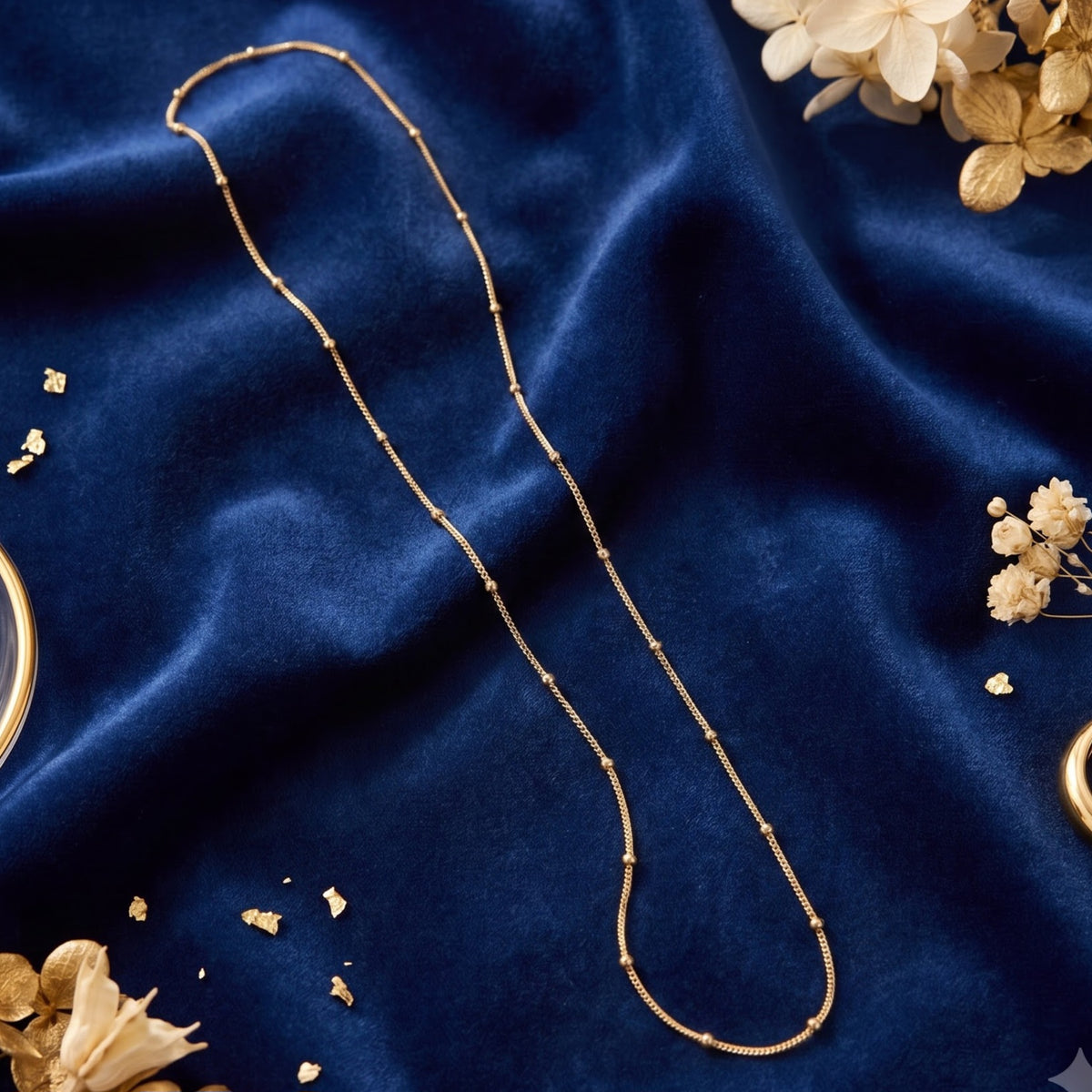 Gold plated chain with small tiny sphere