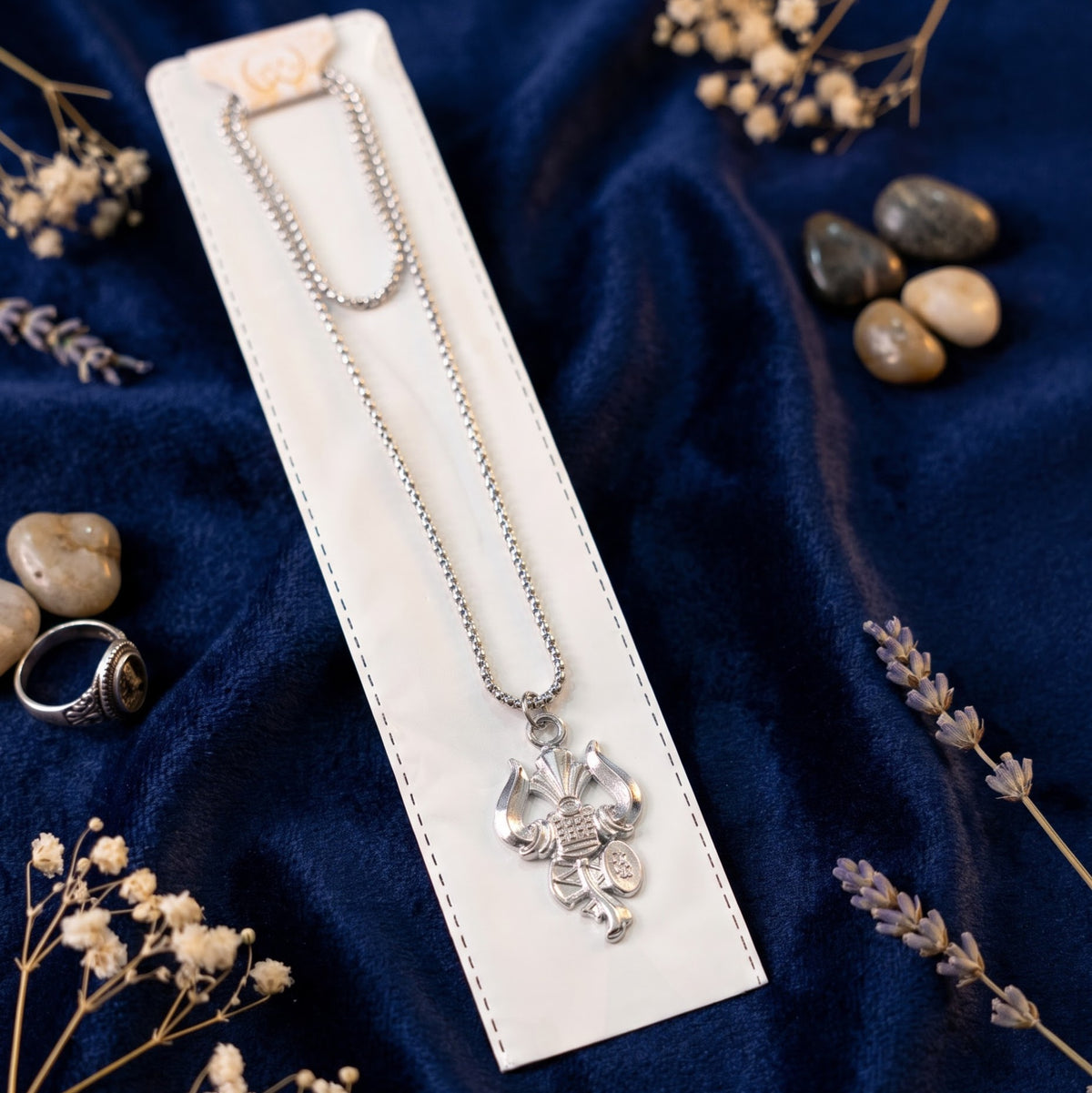 Silver chain with damroo and trishul pendant