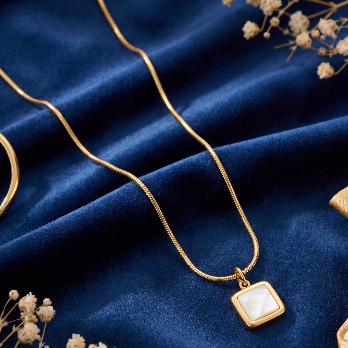 Gold snake chain with locket
