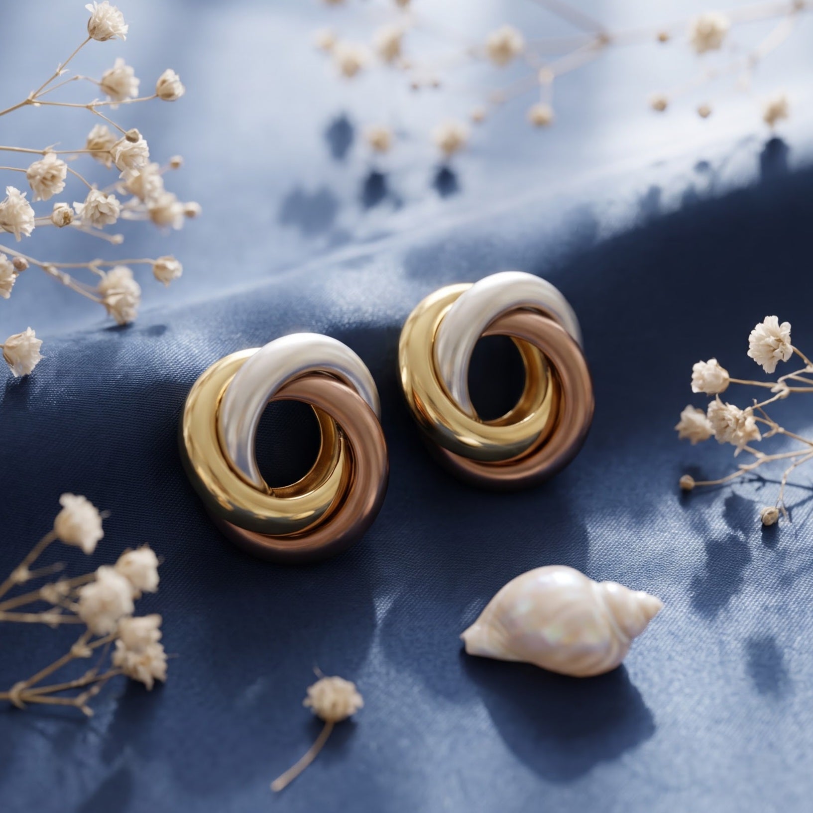 Tri-tone intertwined knot stud earring