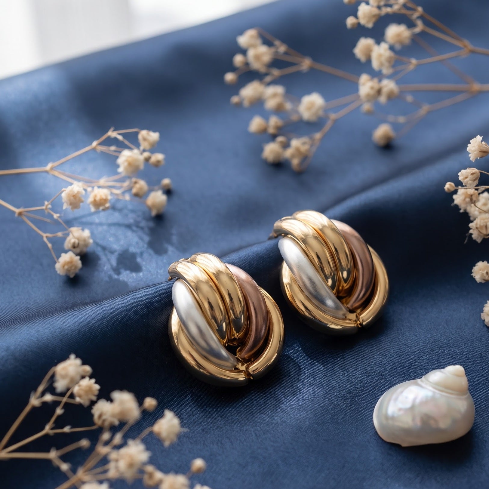 Three tone inter woven knot stud earring