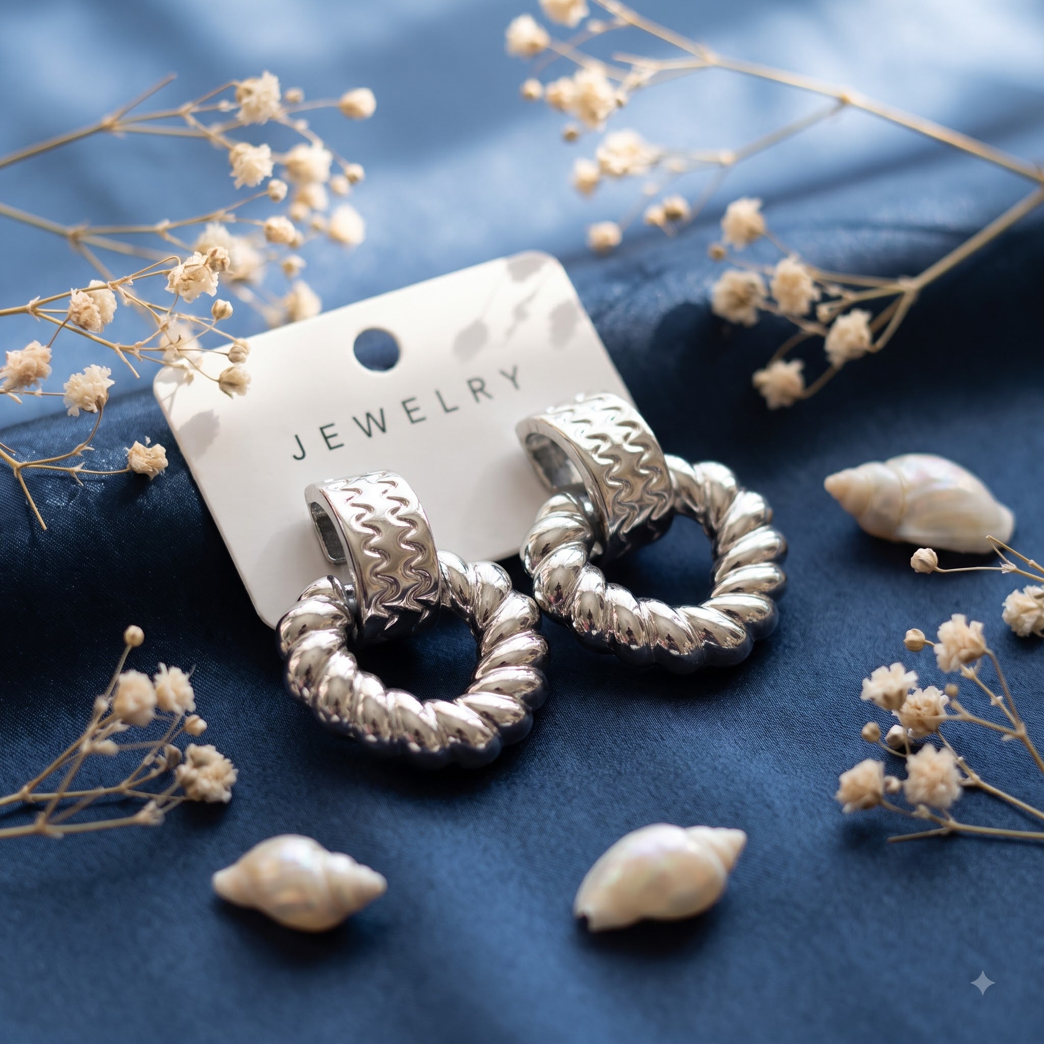 Twisted knot silver dangling earring