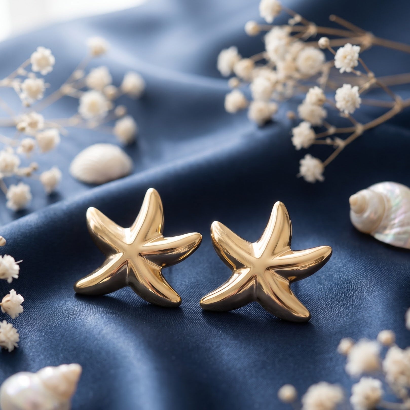 Glossy gold starfish stud