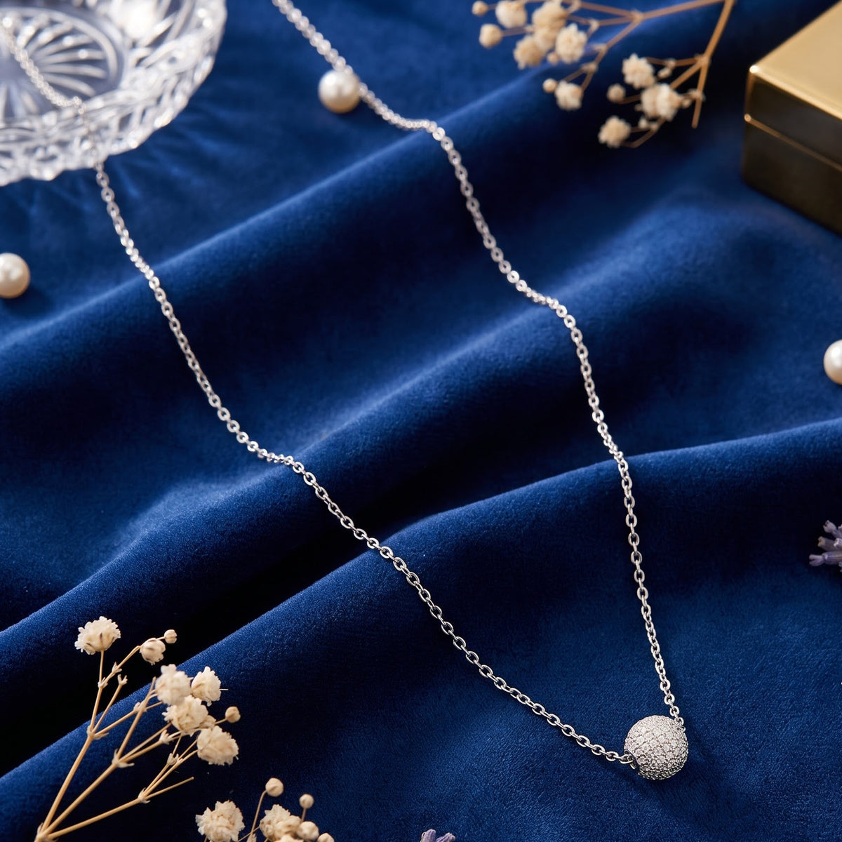 Silver delicate chain with stardust ball pendant