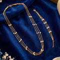 Multi strand  gold chain with pearl and matching bracelet