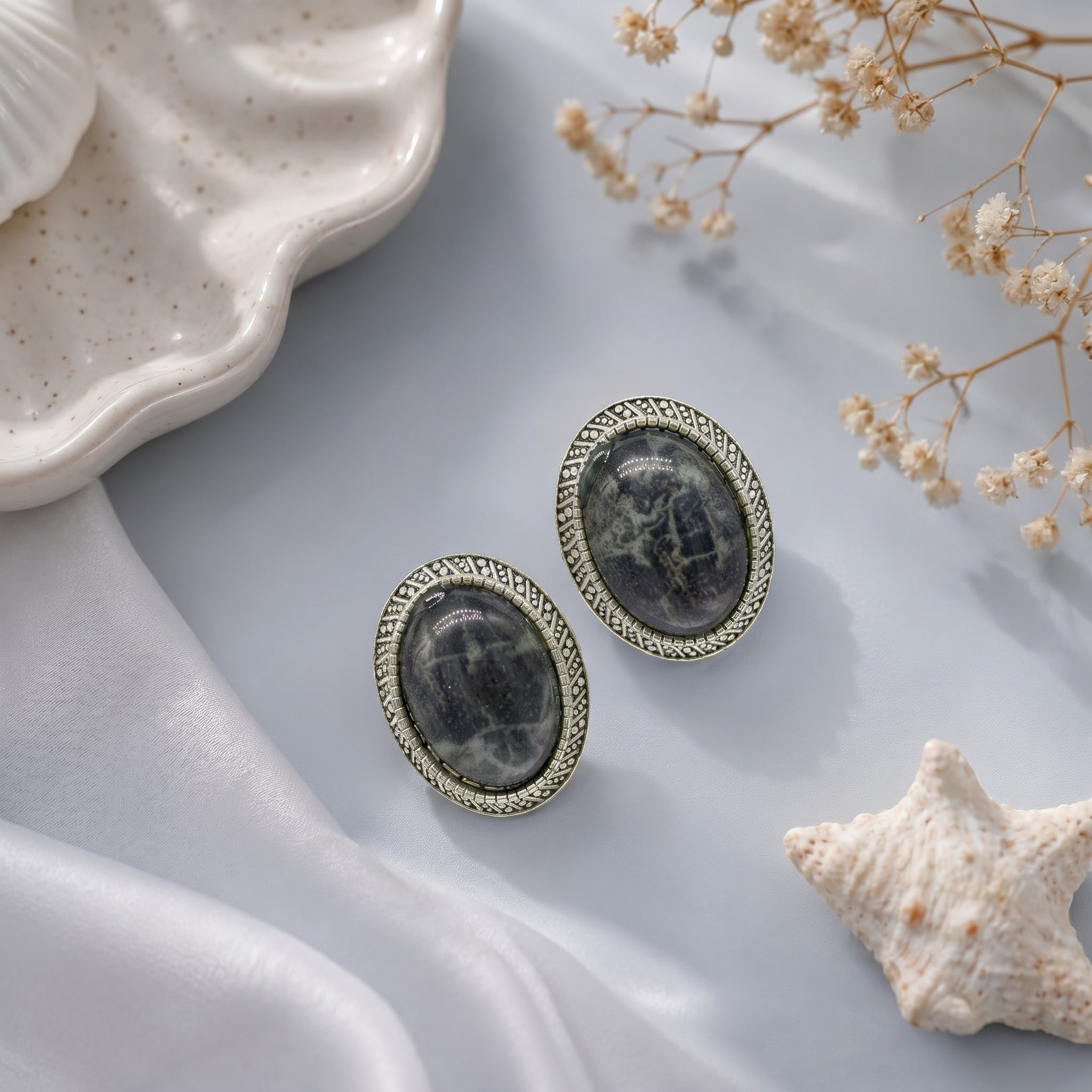 Stone studded oval earring
