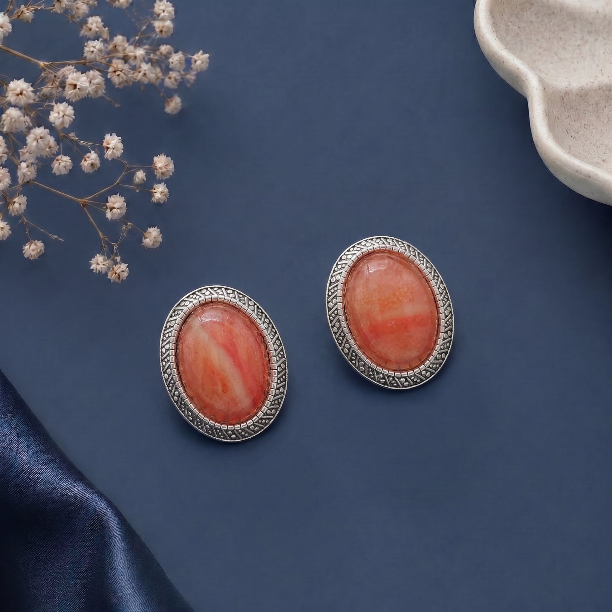 Stone studded oval earring