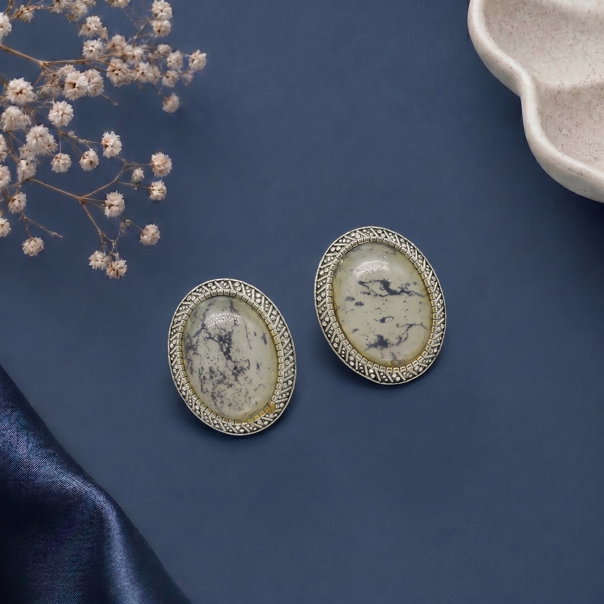 Stone studded oval earring