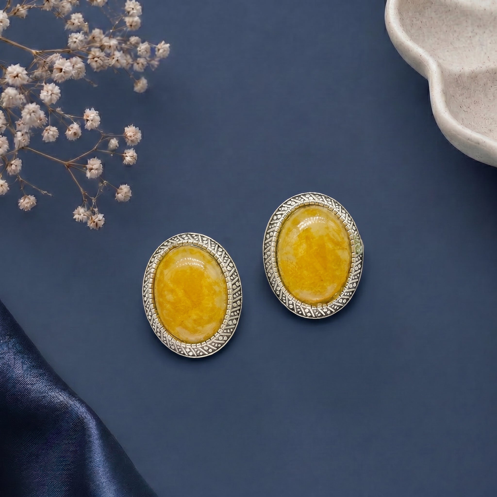 Stone studded oval earring