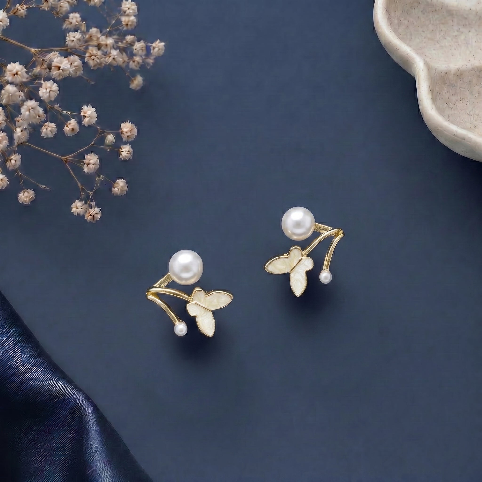 White enamel butterfly and pearl earring