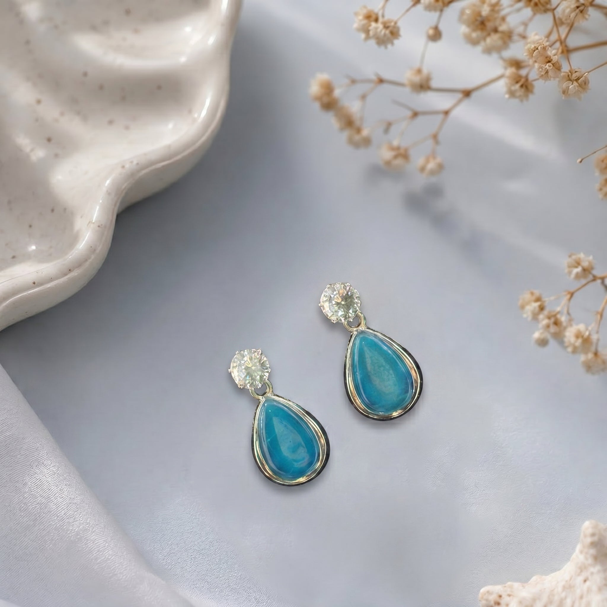 Stone studded dangling earring