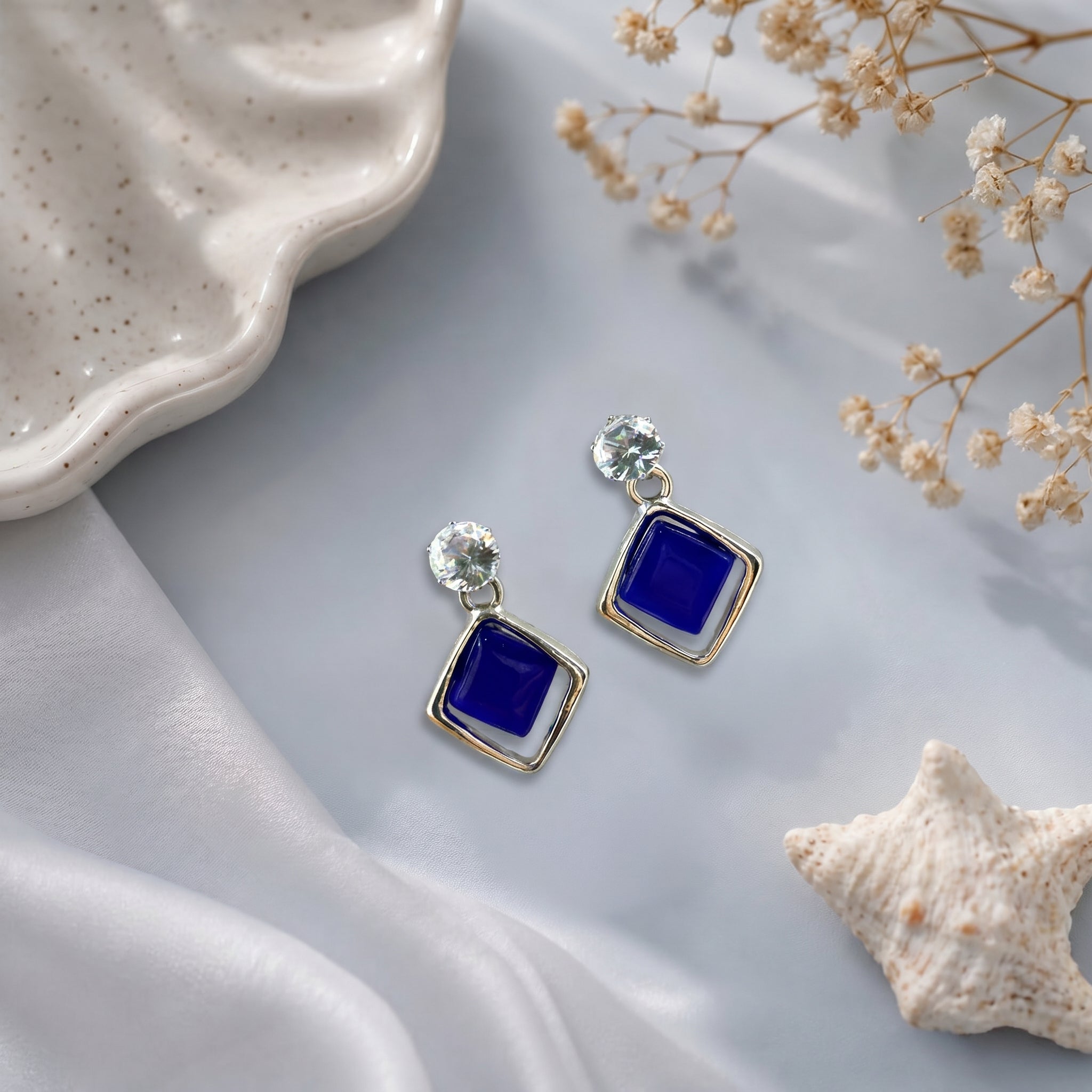 Stone studded dangling earring