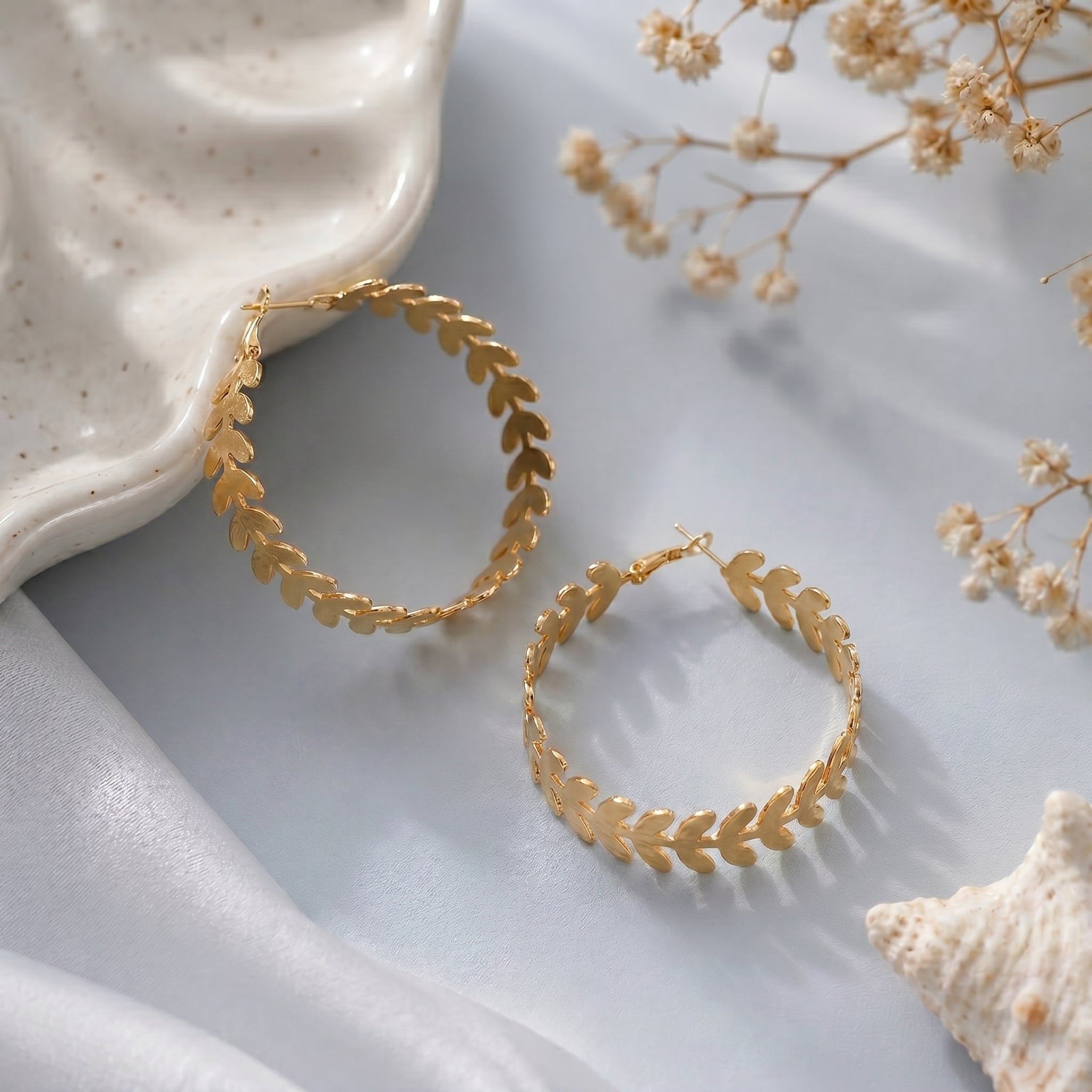 Leaf design hoops earring