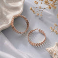 Leaf design hoops earring