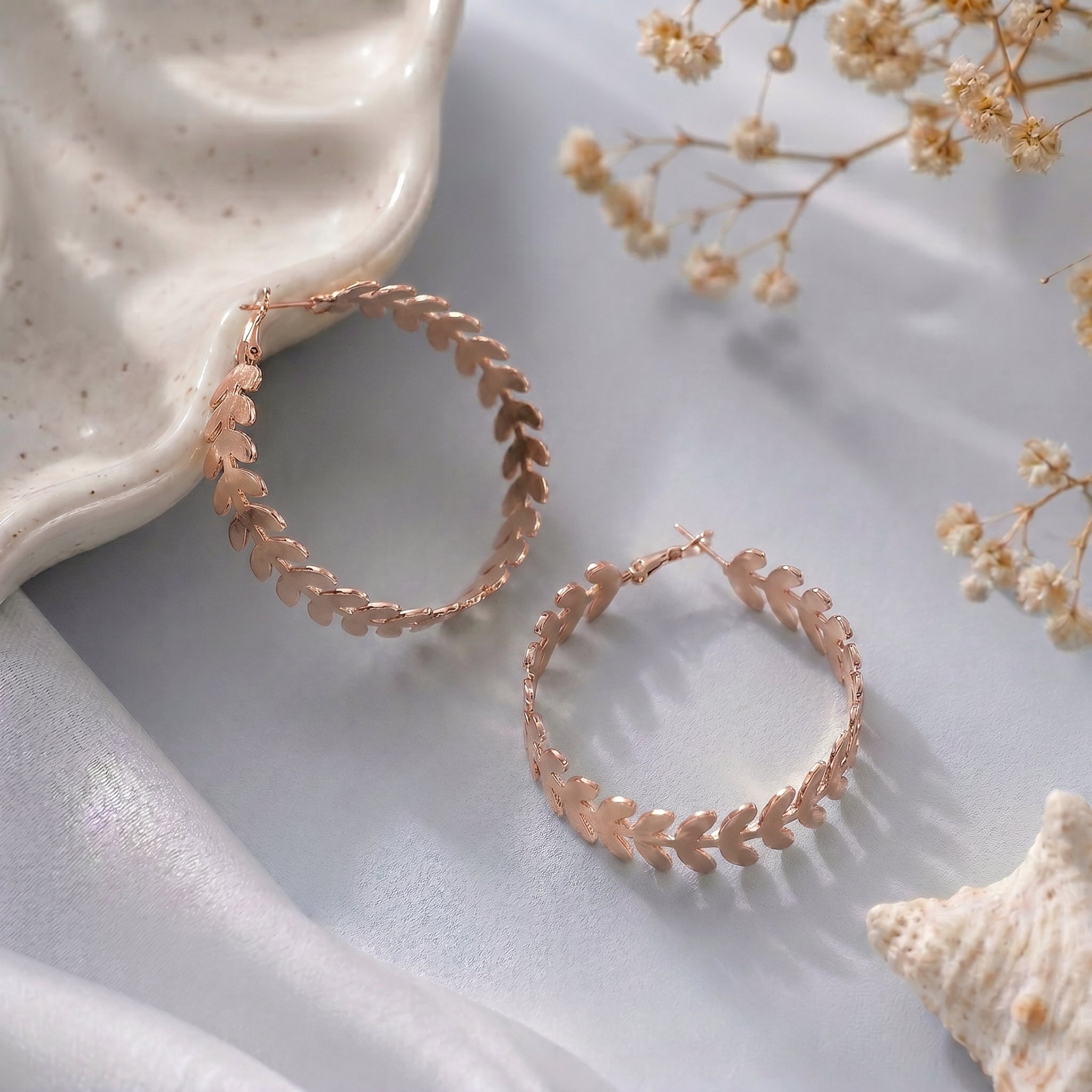 Leaf design hoops earring