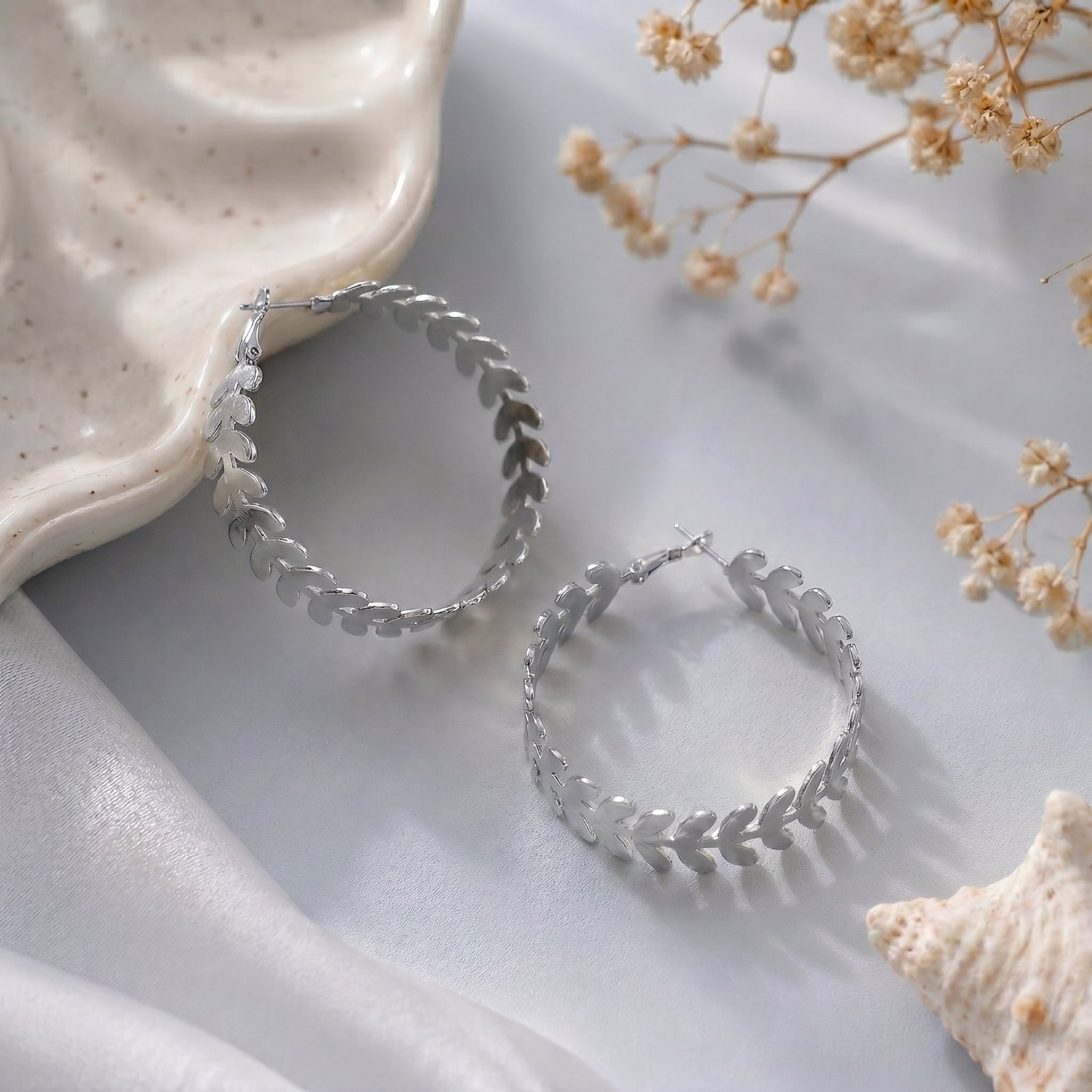 Leaf design hoops earring