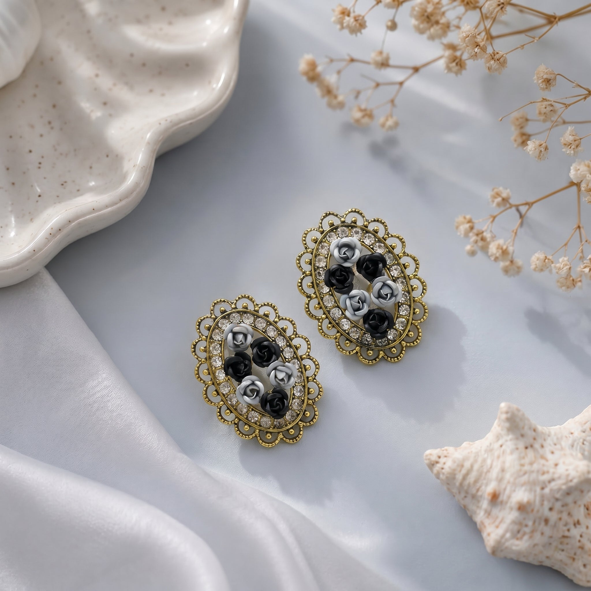 Oval shaped small flower earring