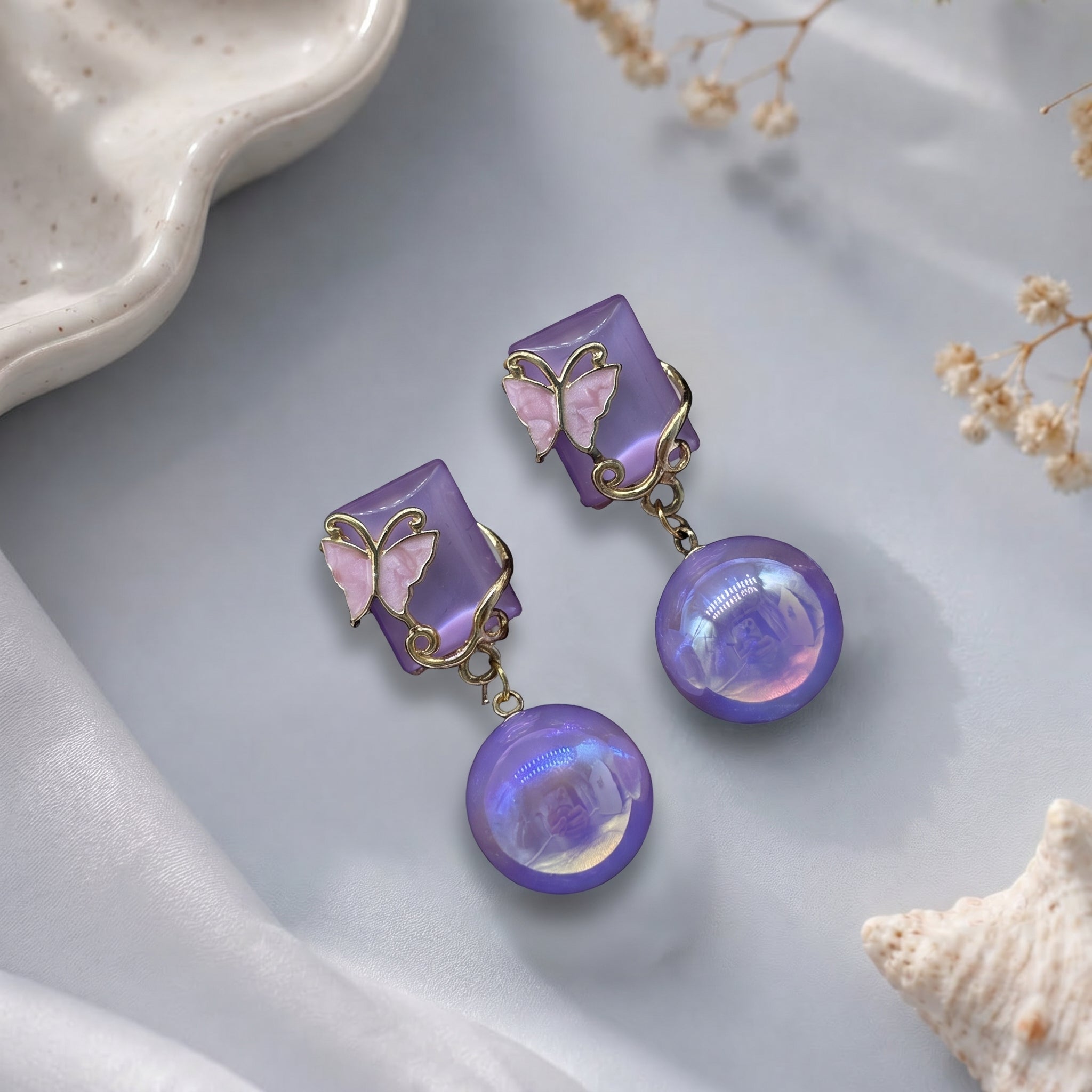 Square head with butterfly earring
