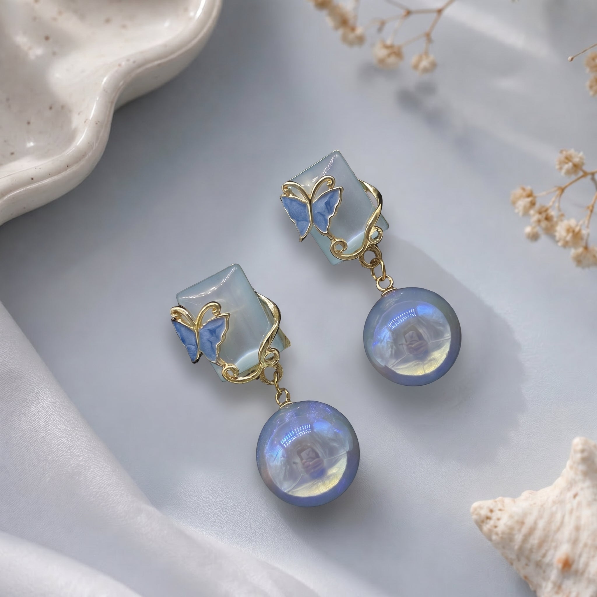 Square head with butterfly earring