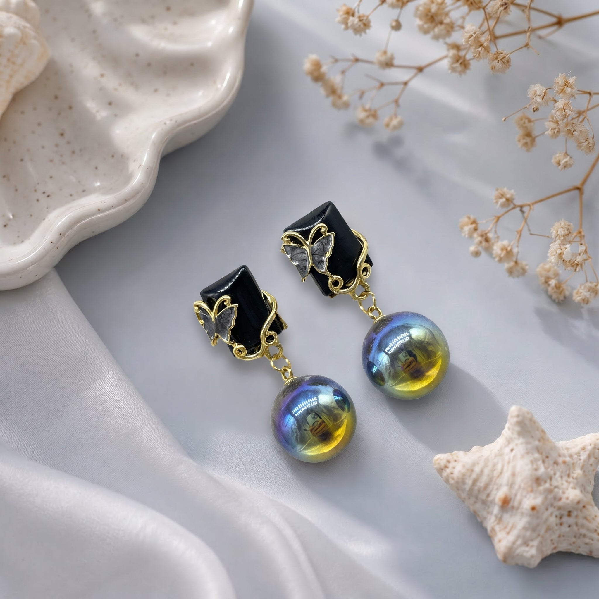 Square head with butterfly earring