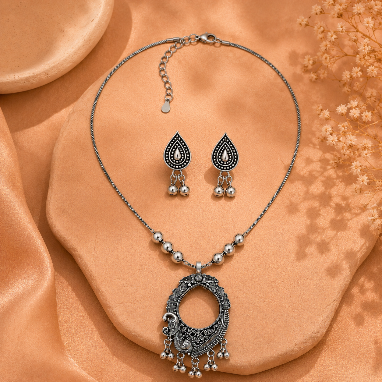 Oxidised peacock design necklace with earring