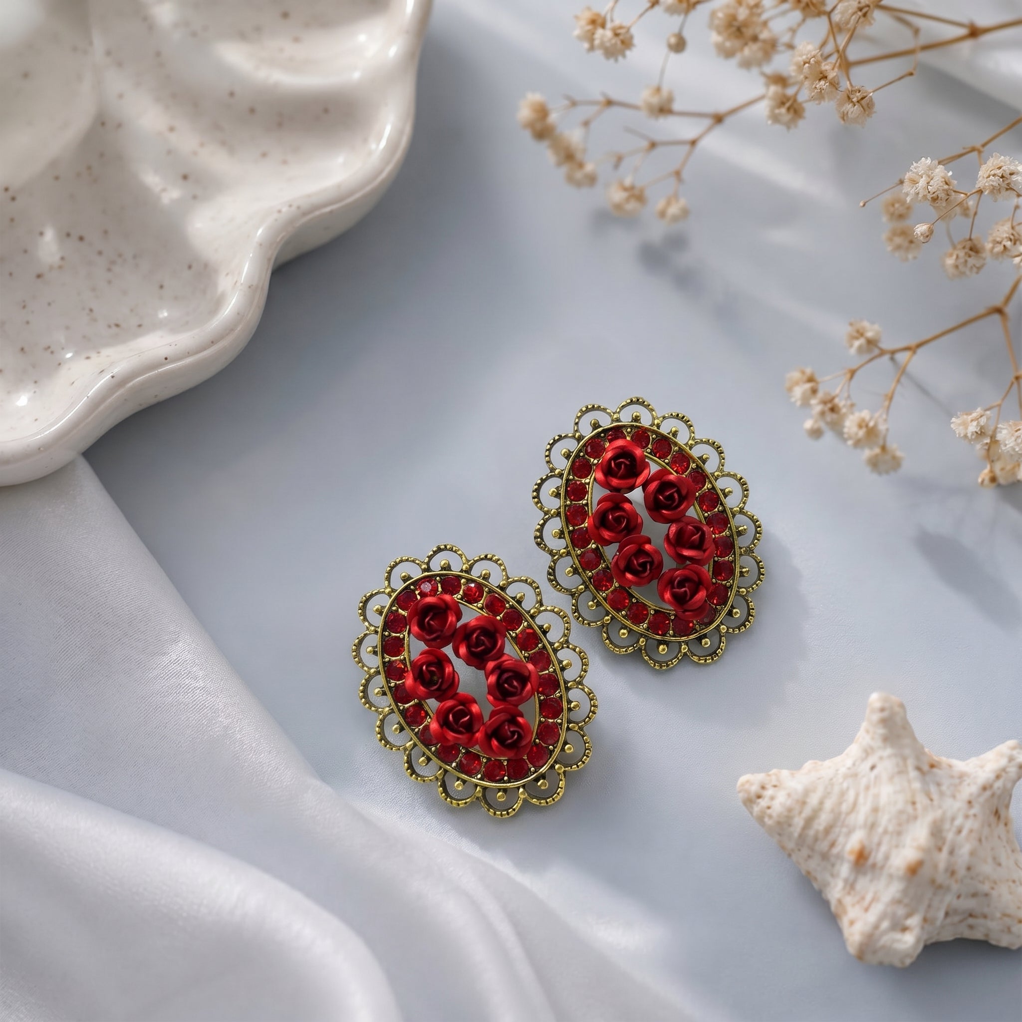Oval shaped small flower earring