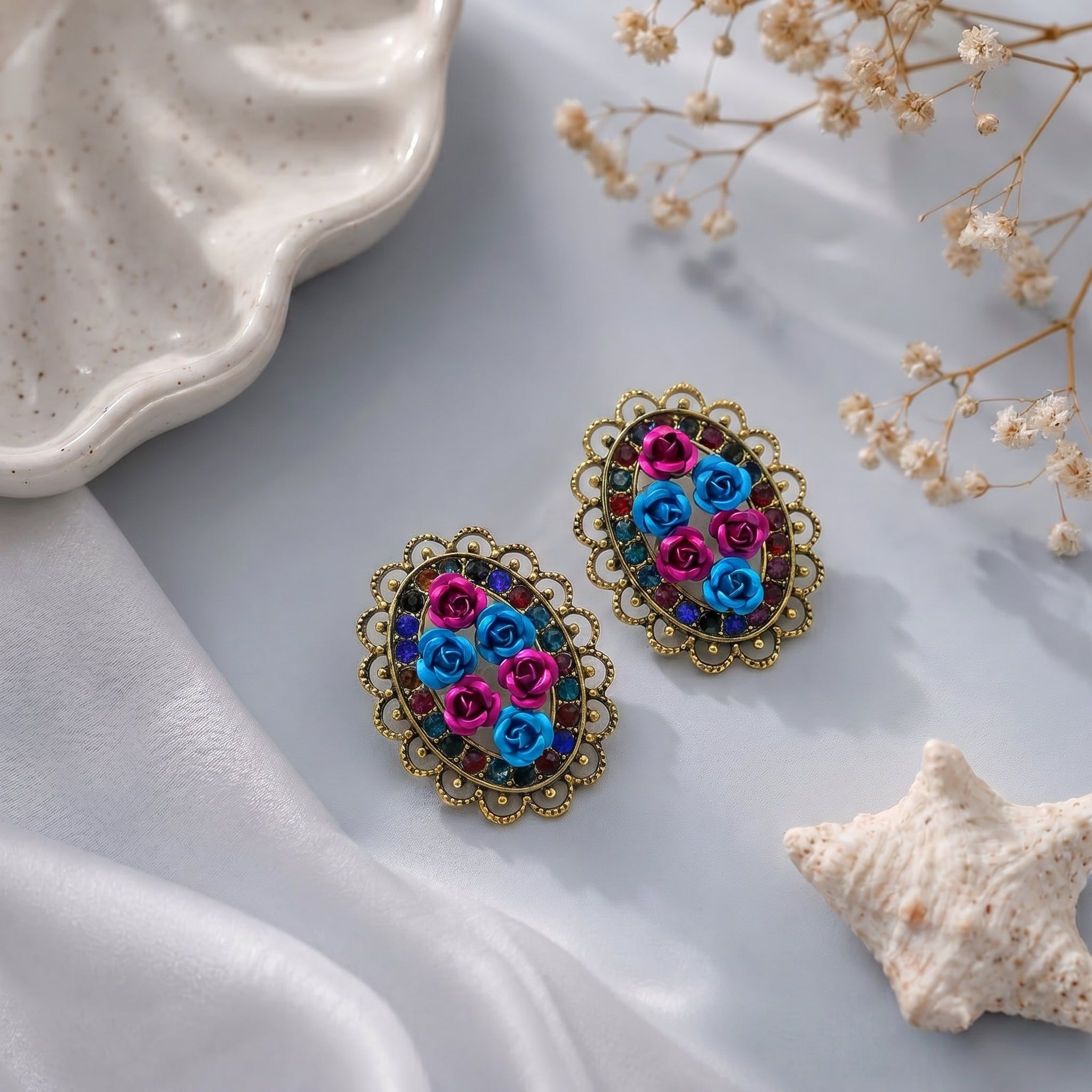Oval shaped small flower earring
