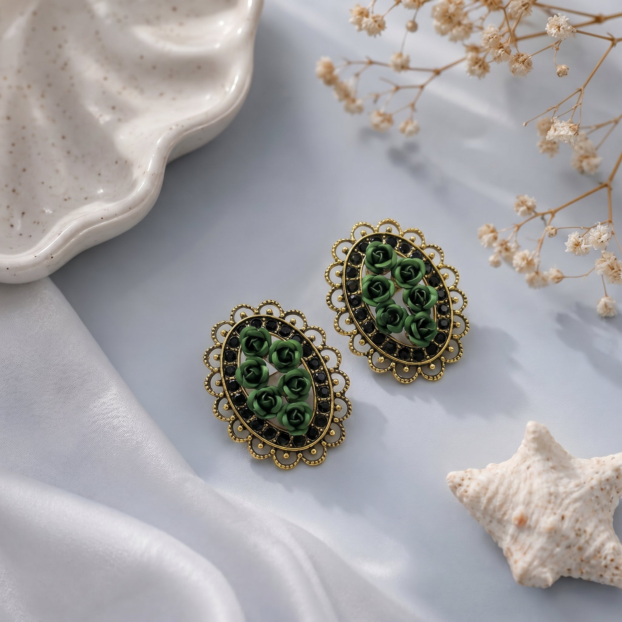 Oval shaped small flower earring