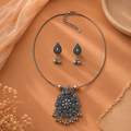 Floral and droplet design oxidised pendant set