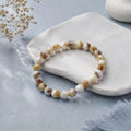 Stretch yellow and white beads bracelet