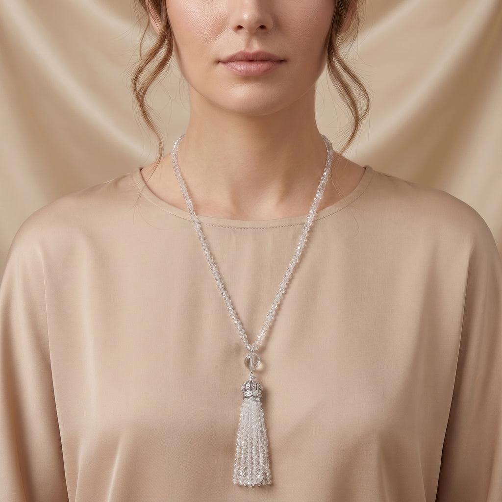 Long crystal necklace with crown style pendant
