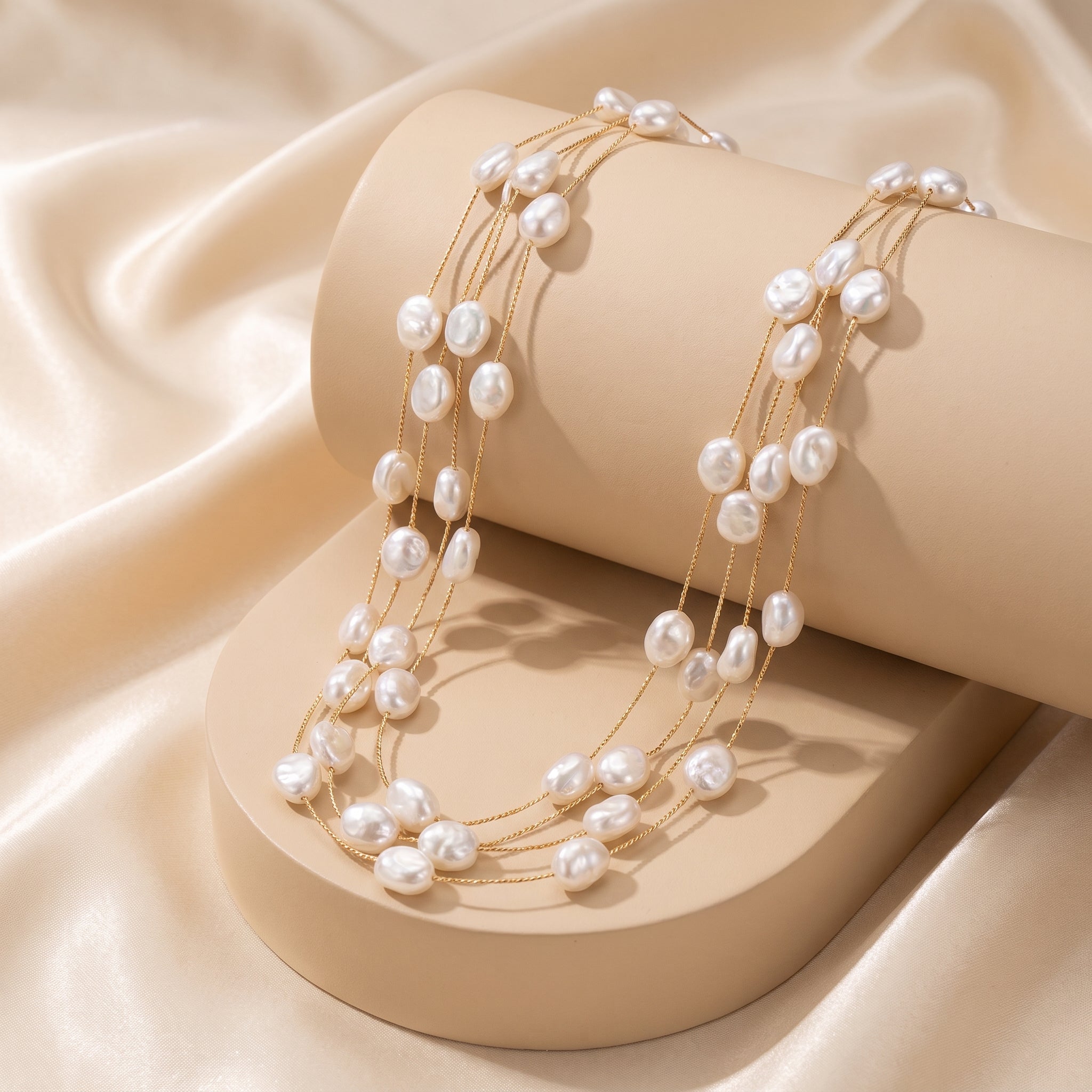 Triple layered pearl necklace
