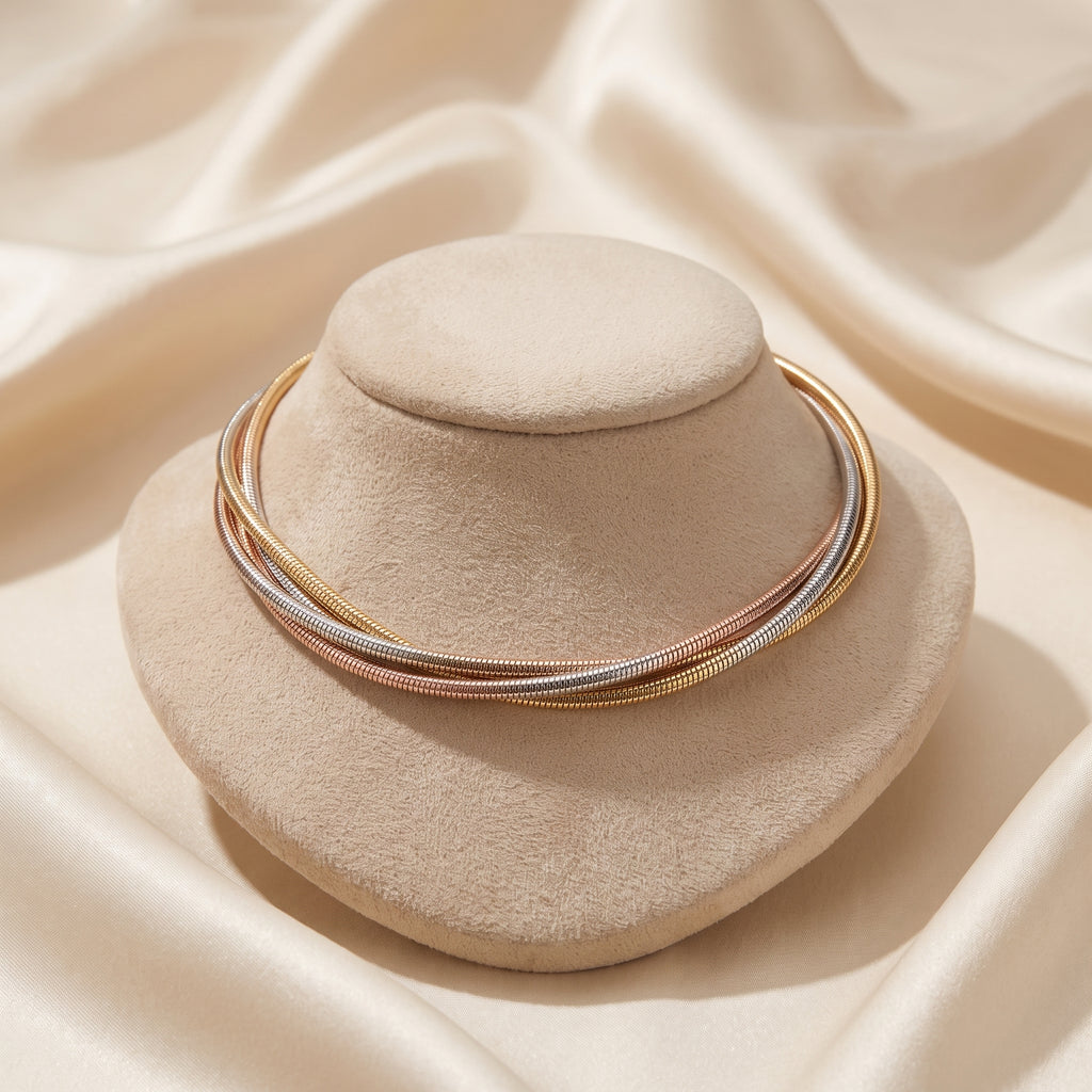 Twisted triple layered choker