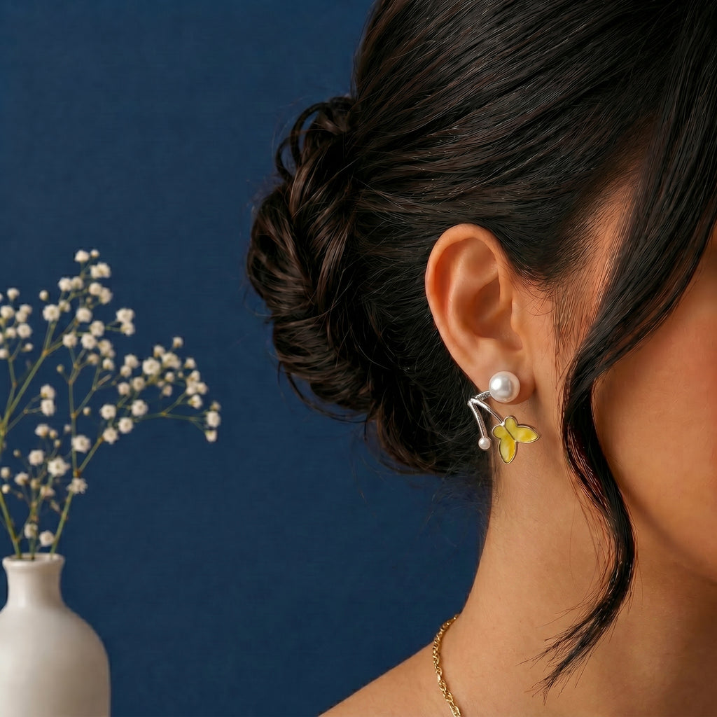 White enamel butterfly and pearl earring