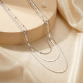 Triple layered long necklace