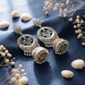 Silver Blossom Jhumkas Earrings