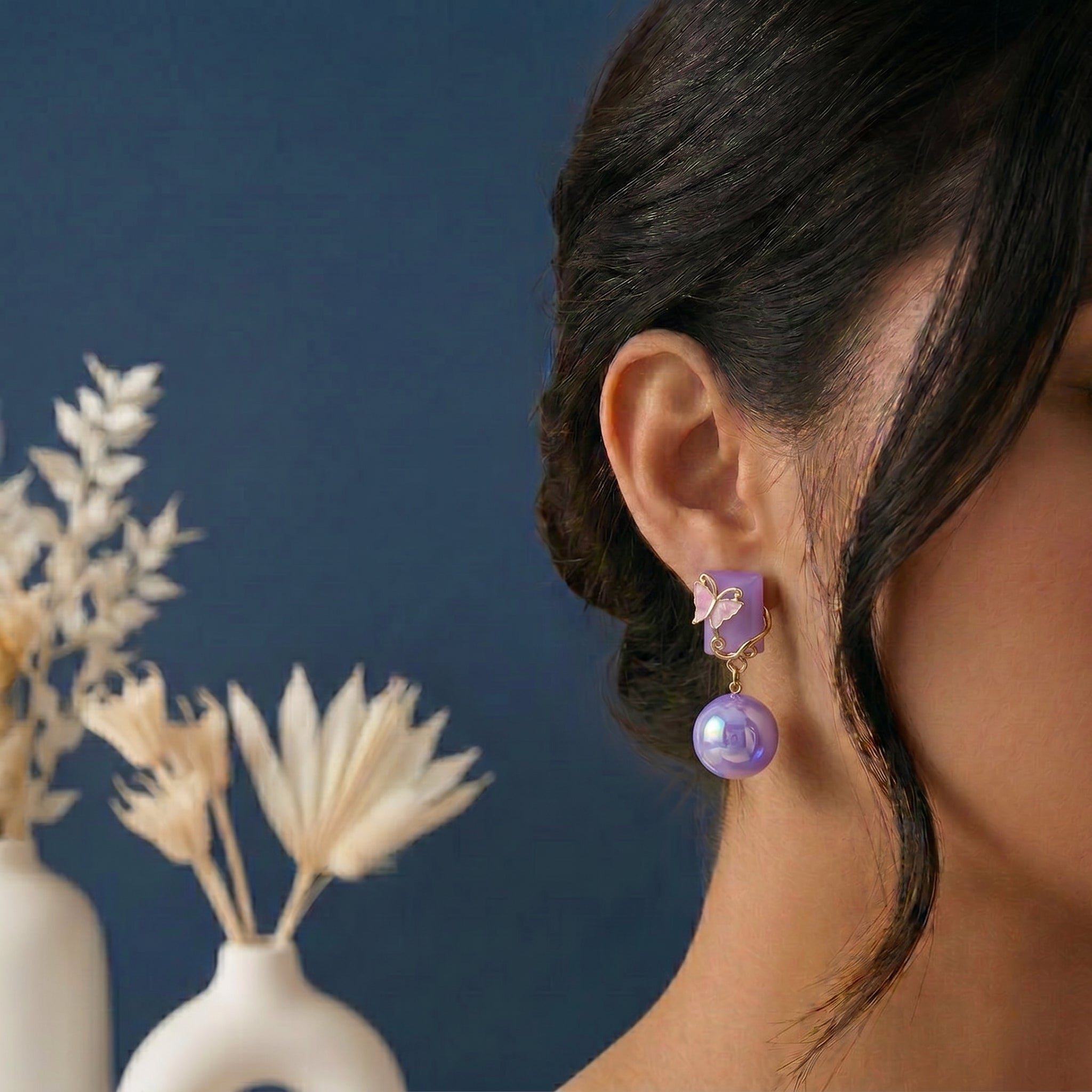 Square head with butterfly earring